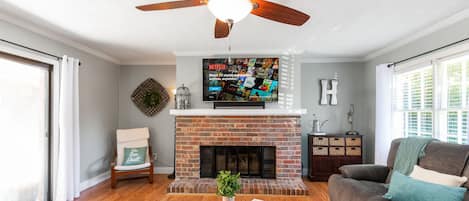 Mounted TV and fireplace