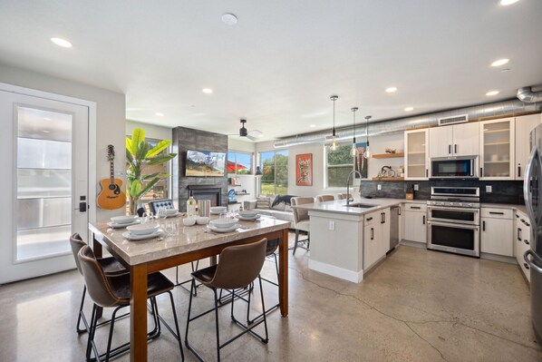Open Concept | Living Area, Dining and Kitchen