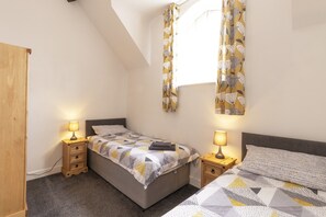 Bedroom with two single beds