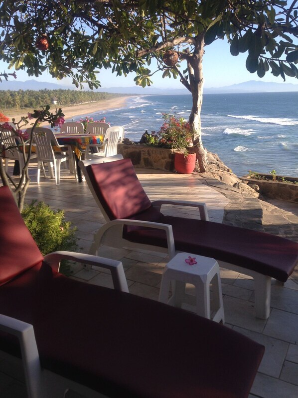 Relax above the surf in privacy or watch the waves while you wax your boards. 