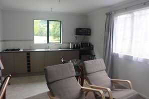 Kitchen, dining table and chairs and two really comfortable recliner chairs