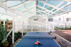 Challenge your mates to a friendly game of ping pong.