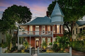 The Grand Maloney Hotel - A historic red brick building with an unmatched location and unique design.