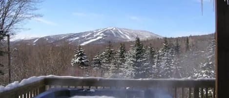 View of Mt. Snow slopes and hot tub on deck