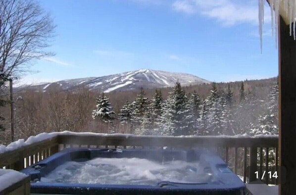 View of Mt. Snow slopes and hot tub on deck