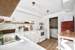 Btw, check out our red retro fridge! Washer and dryer is also in the pictures . 