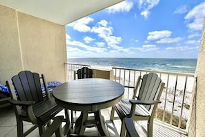 Pull up a chair - the view's amazing.  The Polywood balcony set is built for comfort, style, and soaking in every ocean breeze.