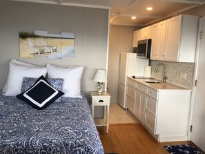 bed and kitchen areas