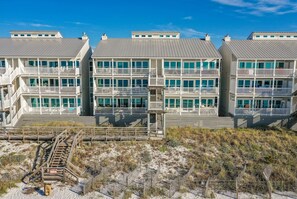 Access beach from porch and down the stairs or elevator down and walk around. 