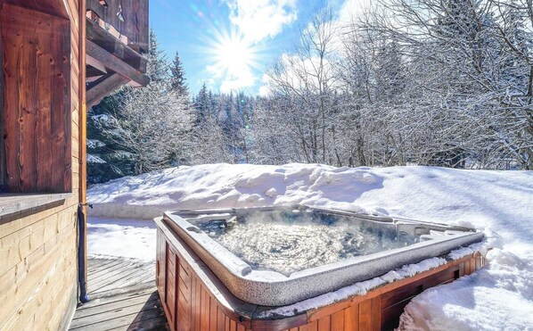 Soothe your muscles in the private hot tub!