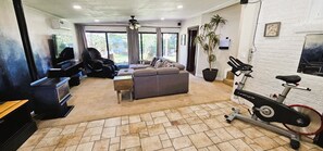 Guest's Private Living Room with Private Bathroom UPSTAIRS.