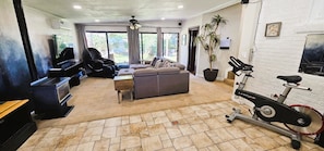 Guest's Private Living Room with Private Bathroom UPSTAIRS.