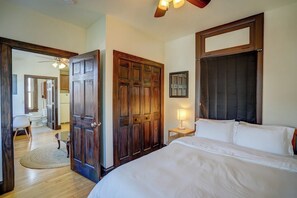 Bedroom with queen mattress and private closet.