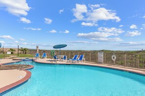 Come relax at your beach front pool and enjoy the gorgeous island climate!