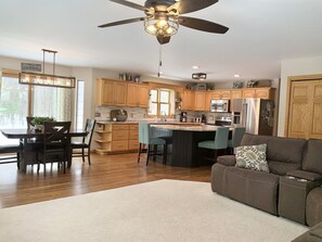 Large sectional couch, very comfy for laying down & relaxing. Reclining ends