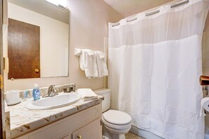 Bathroom with tub/shower.