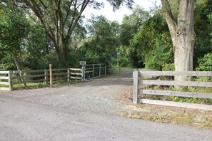 Entry gate with keypad.