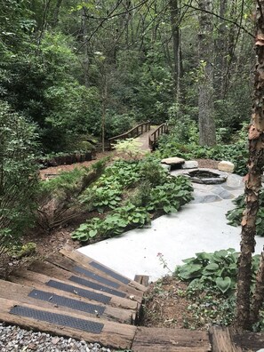 Steps to fire pit and bridge across stream