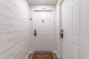 Front door to end unit condo