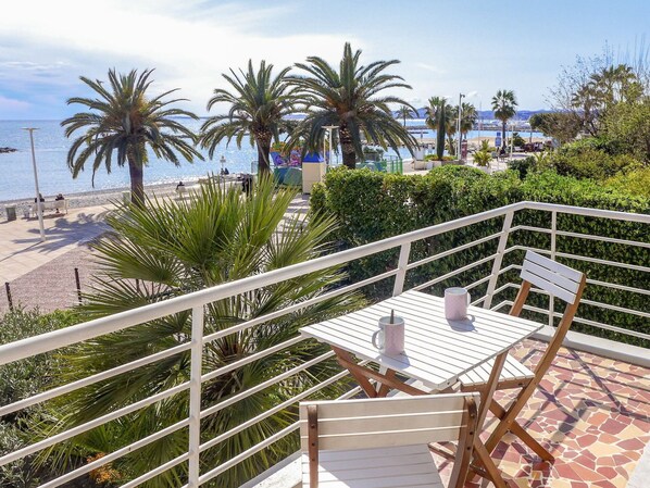 Sky, Cloud, Water, Plant, Property, Building, Azure, Tree, Outdoor Furniture, Seaside Resort