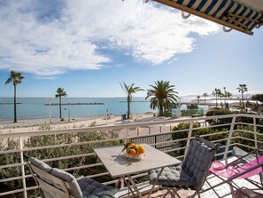 Sky, Cloud, Water, Plant, Furniture, Property, Building, Chair, Seaside Resort, Table