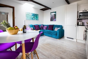 Lavender Cottage with large teal corner sofa