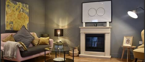 Stylish Living Room real flame effect fireplace and smart TV. 