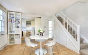 Open plan dining area through to fully fitted kitchen. 
