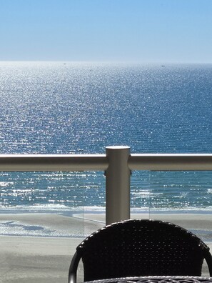 Beautiful unobstructed pool and ocean view from condo balcony