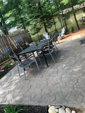 Back/side patio. Perfect for playing cards and enjoying a cocktail.