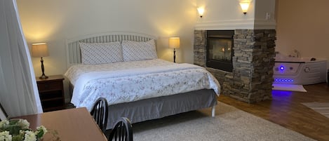 King bed, Fire place, and large jetted tub. 