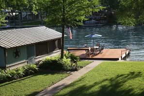 View of Lake McQueeney from our new docks, include table, chairs & umbrella.