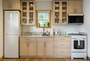 Full kitchen equipped with everything you need to cook at home