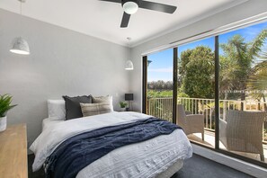 Main Bedroom - Listen to the waves at night. Storage in large walk in robe. 