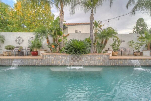 This Backyard Oasis Awaits You!