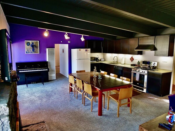 Dining table has seating for 8. - Welcome to Purple Rain, this home is fit for a "prince."