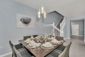 The dining area exudes a cool vibe with its modern aesthetics and inviting ambiance.
