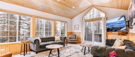 Living room with lofted ceilings