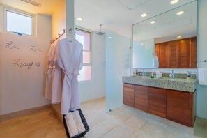 Guests are provided with luxury spa robes and slippers for use at the property