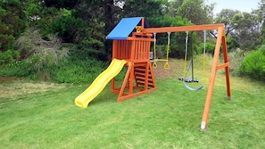 Our new kids' play set with swing and slide.