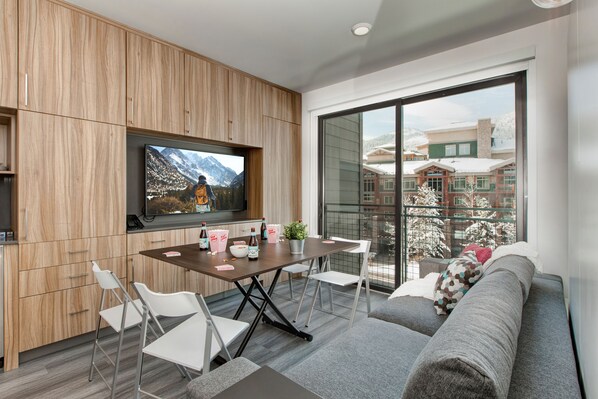 Coffee Table Converts into a Dining (or Game Table) with Four Folding Chairs