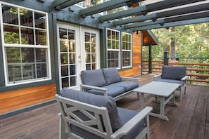 Conversational sofa set on the top deck just outside the living room