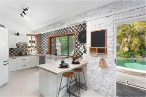 Kitchen with views of the pool area