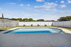 Soak up the rays while the kids splash around in this sparkling pool.