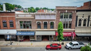 All of our buildings pictured here have been historically restored and the house six beautiful lofts! Book your stay today and Live Like a Local.
