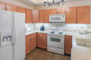 The kitchen is stocked with spices, olive oil, and all the basic essentials so that you can prepare your meals. 