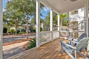 "Sweet N Salty"; Front porch with Adirondacks and hammock