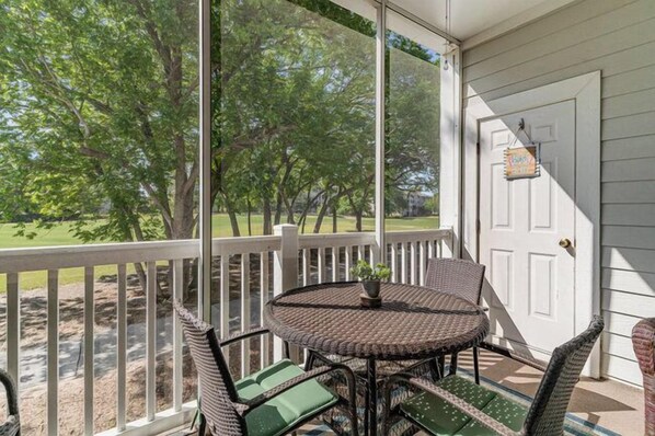 Screened in Balcony Sitting Area