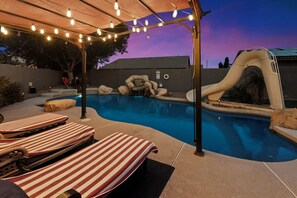 Chaise chairs under pergola
