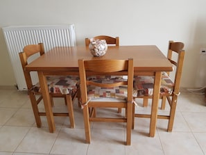 Indoor dining with extending table. Infant chair available if required.
